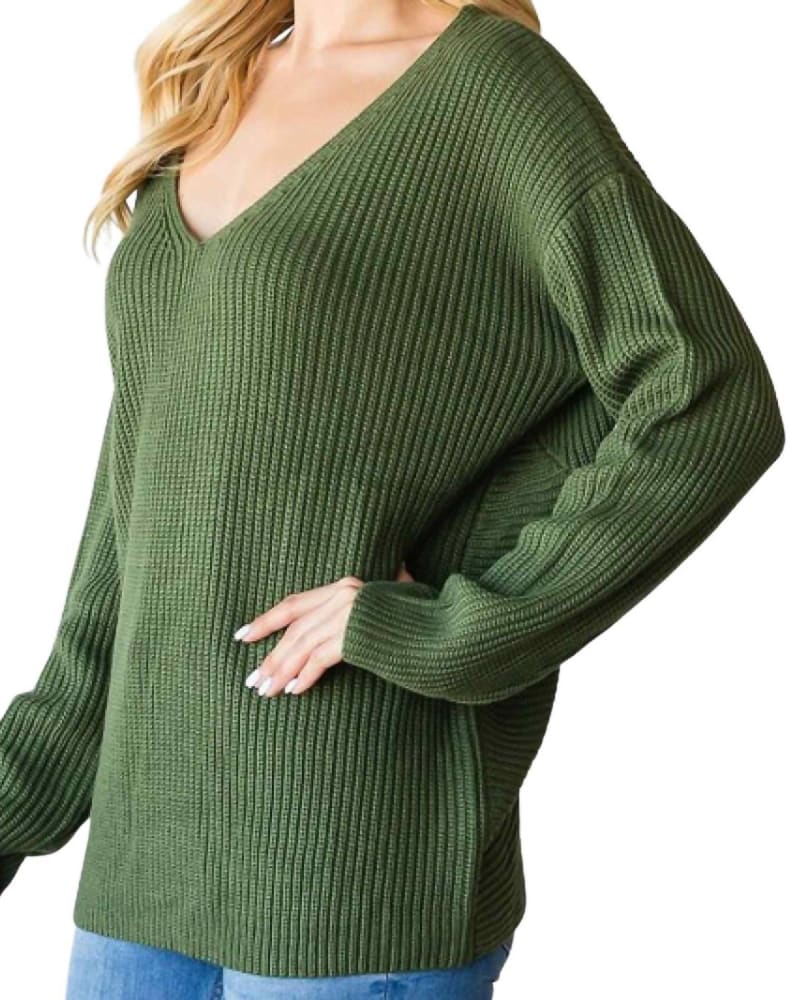 Front of a model wearing a size 2X Twisted Open Back Sweater in Olive in Olive by CY Fashion. | dia_product_style_image_id:341232